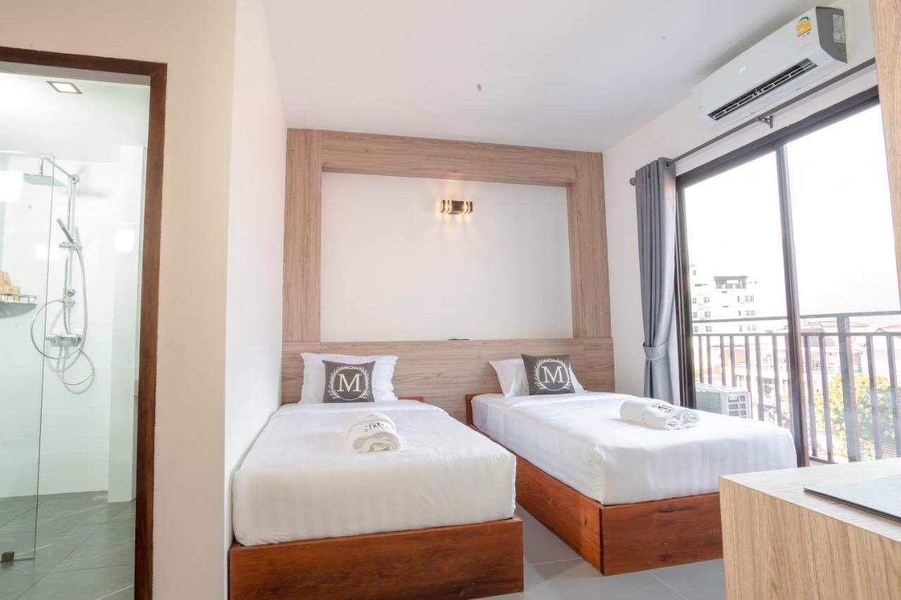 M&M Hotel Vang Vieng Exterior photo